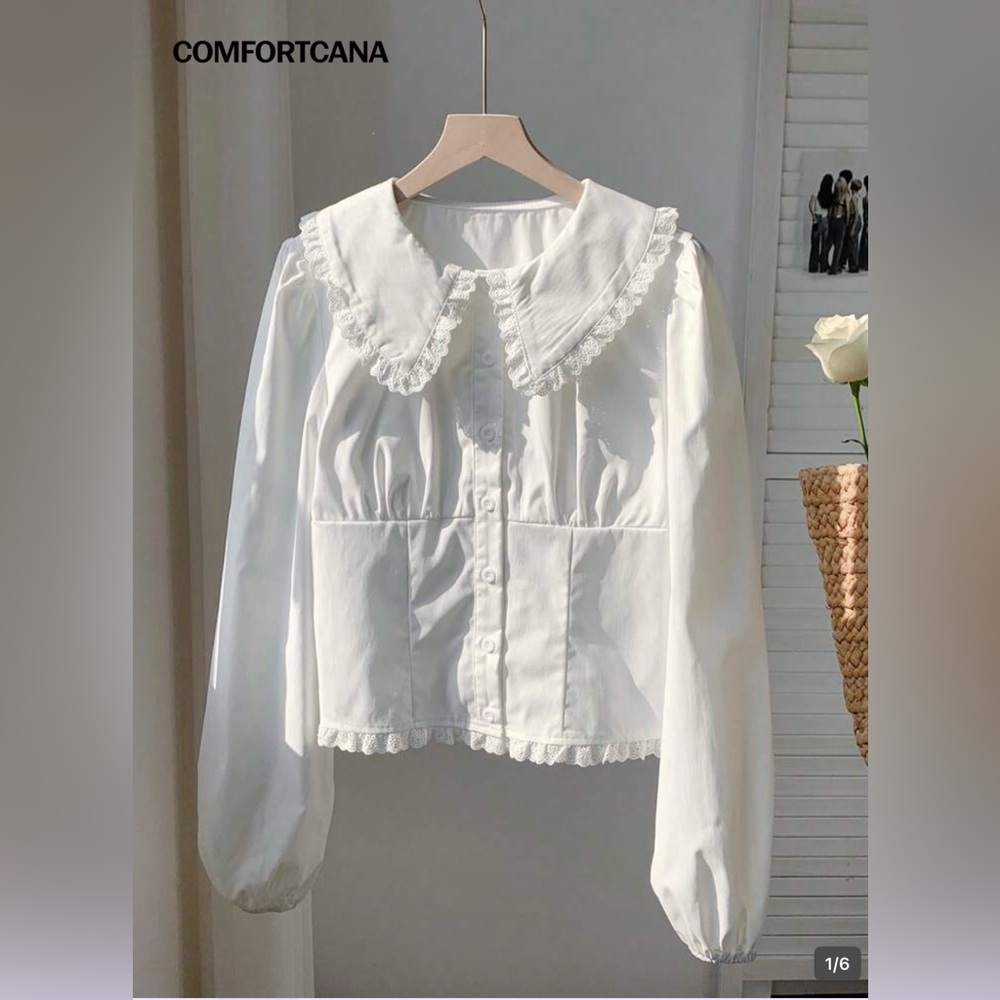 Elegant White Lace-Trimmed Blouse